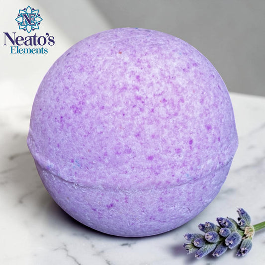 Neatos Elements Goddess of the Night Bath Bomb with dried rose petals scattered around it.