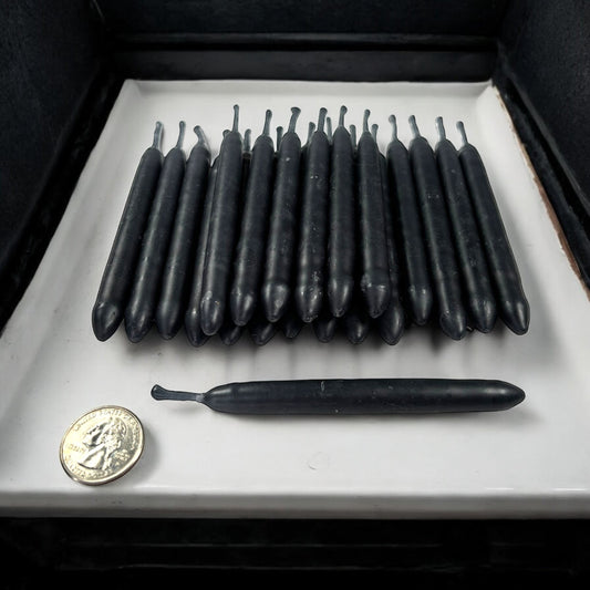 Neatos Elements hand-dipped black chime candles, approximately 4.25" long, for protection and divination rituals.