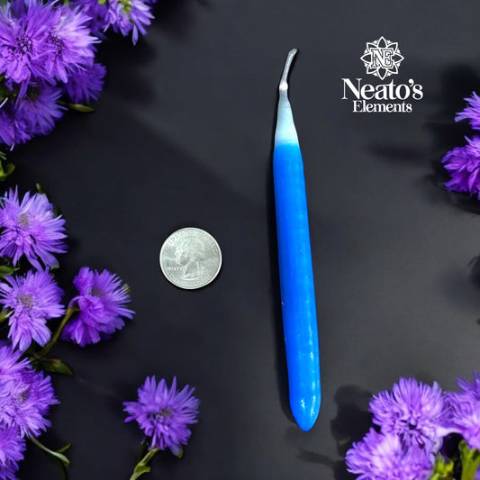 Neatos Elements blue hand-dipped taper candle with white tip, for protection and intention work.