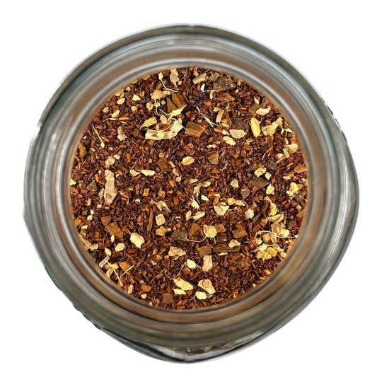 Neatos Elements Choco Chai Tea Blend loose leaf tea with rooibos, ginger, cardamom, and chocolate chips.