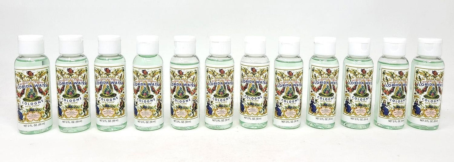 Neatos Elements Florida Water Cologne, 2 oz bottles with white caps. Features a clear liquid and ornate labels with floral and figural designs.