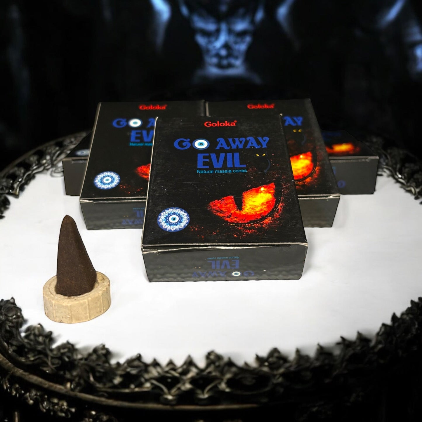 Neatos Elements Go Away Evil incense cones, natural masala, black box with fiery eye and blue evil eye symbol.