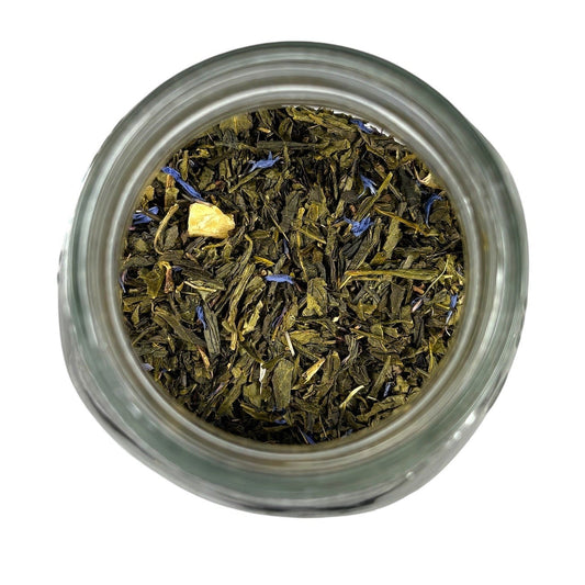 Neatos Elements Paradise Green Tea Blend loose leaf tea with pineapple pieces and blue cornflower petals.