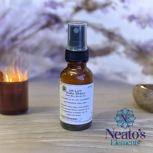 Neatos Elements Up-Lift Crystal Infused Aura Boosting Spray in amber glass bottle with black spray top. Citrus scent.