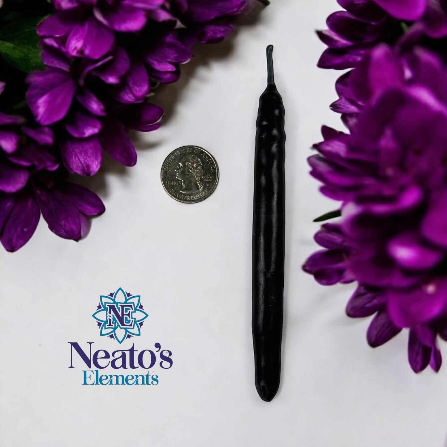Neatos Elements hand-dipped black candle, approximately 5.25 inches long, with textured surface. A quarter is shown for scale.