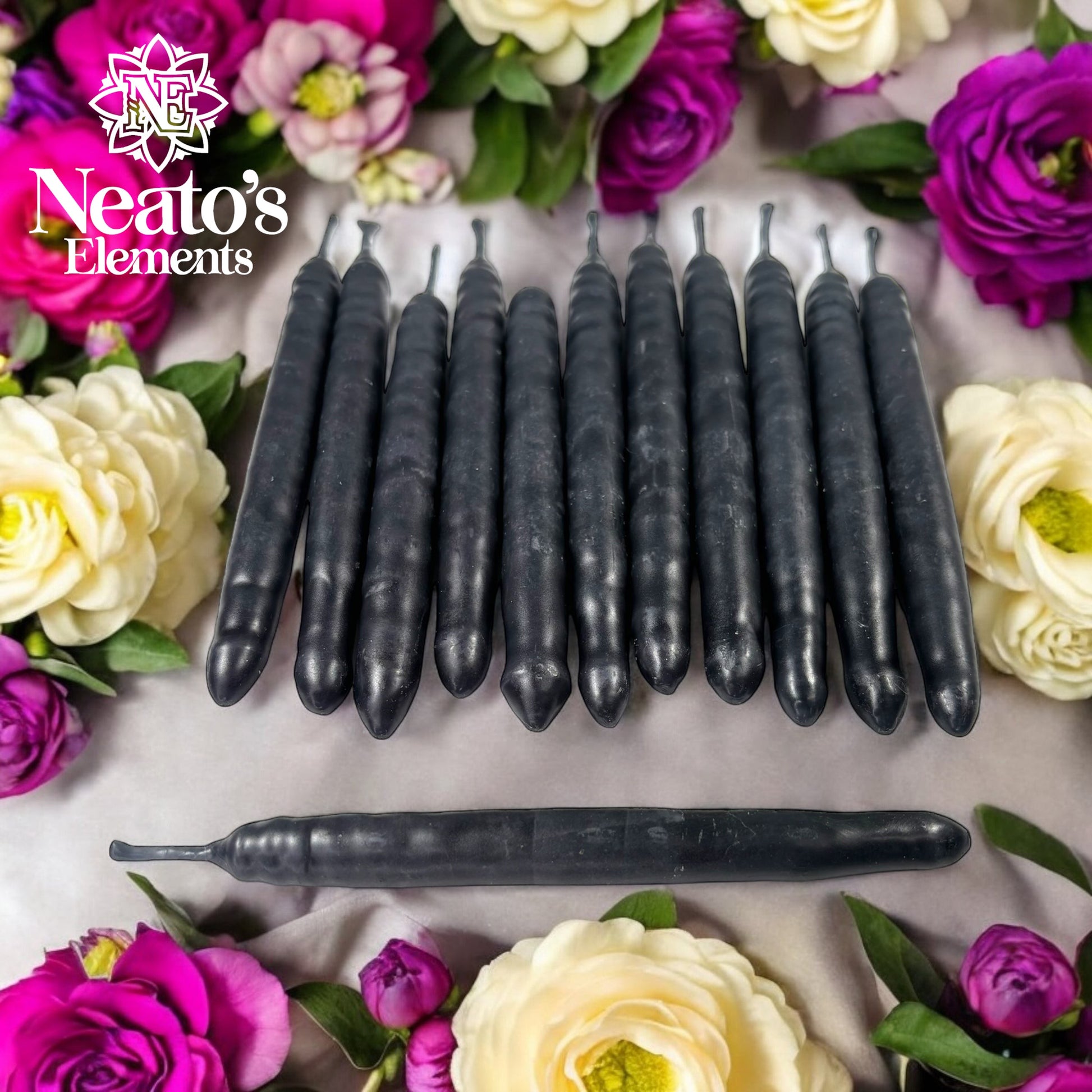 Neatos Elements hand-dipped black candles, approximately 5.25 inches long, with ribbed texture. Ideal for protection, scrying, and divination.