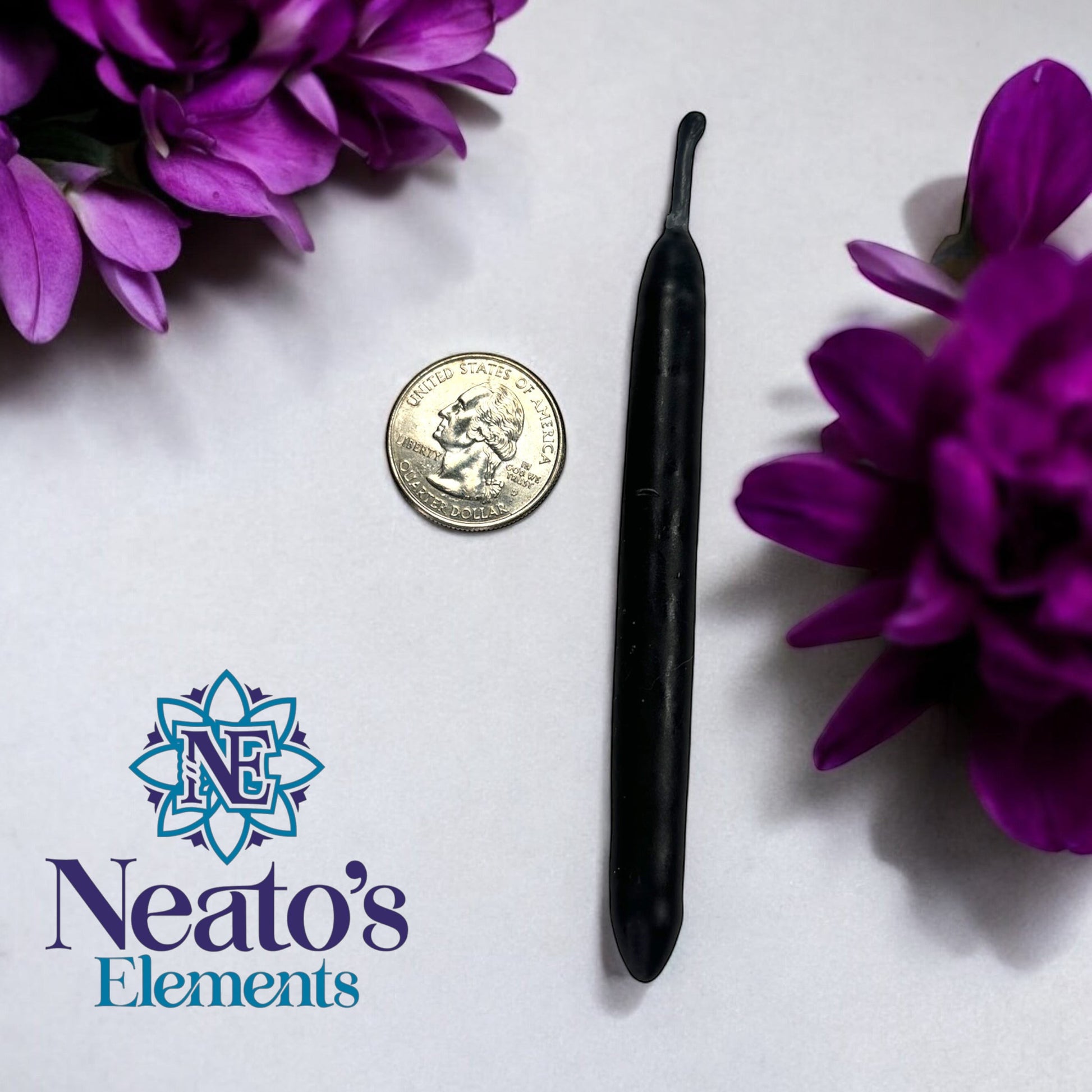 Neatos Elements hand-dipped black chime candle, approximately 4.25 inches long, for protection and divination.