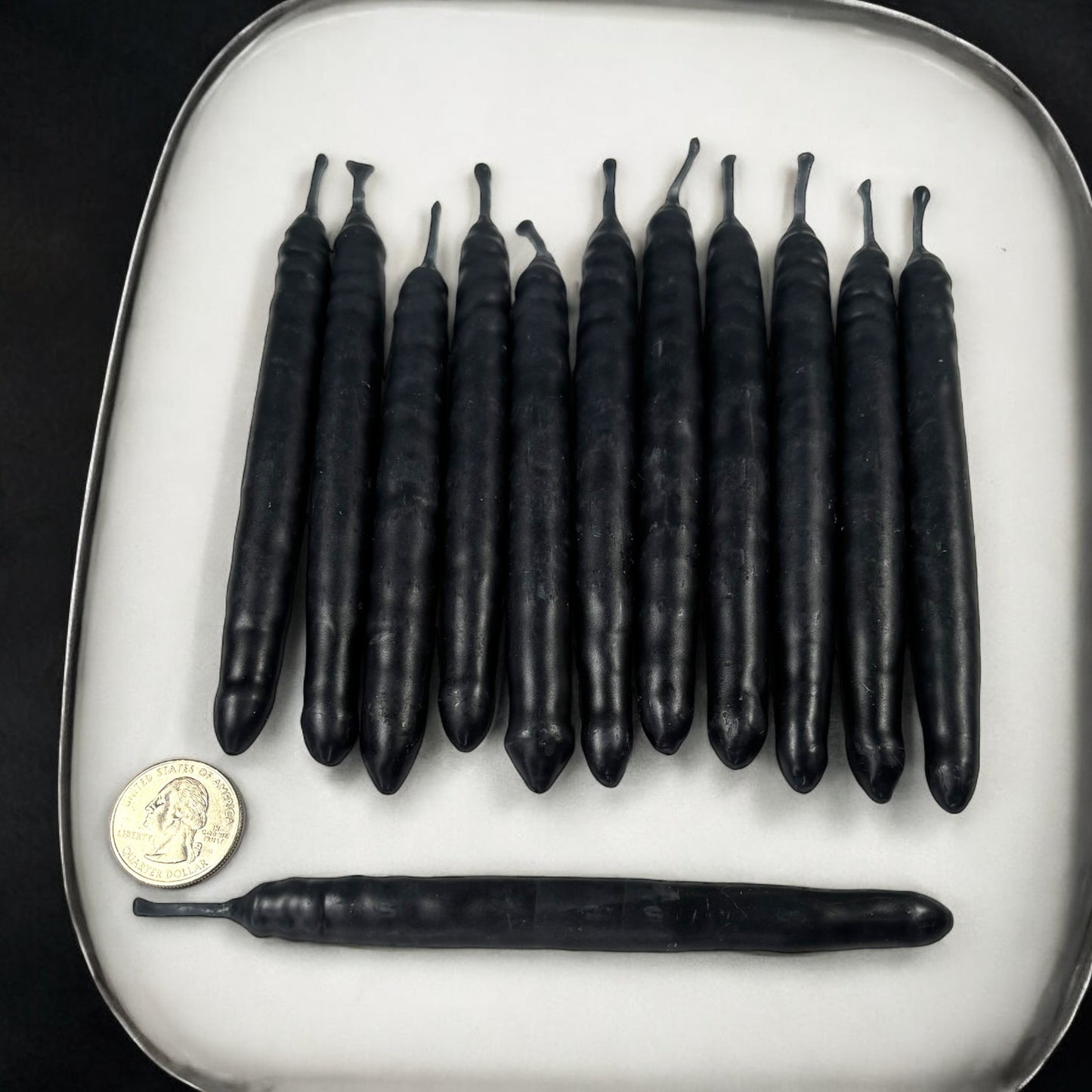 Neatos Elements hand-dipped black taper candles, approximately 5.25 inches long, ideal for scrying and divination.