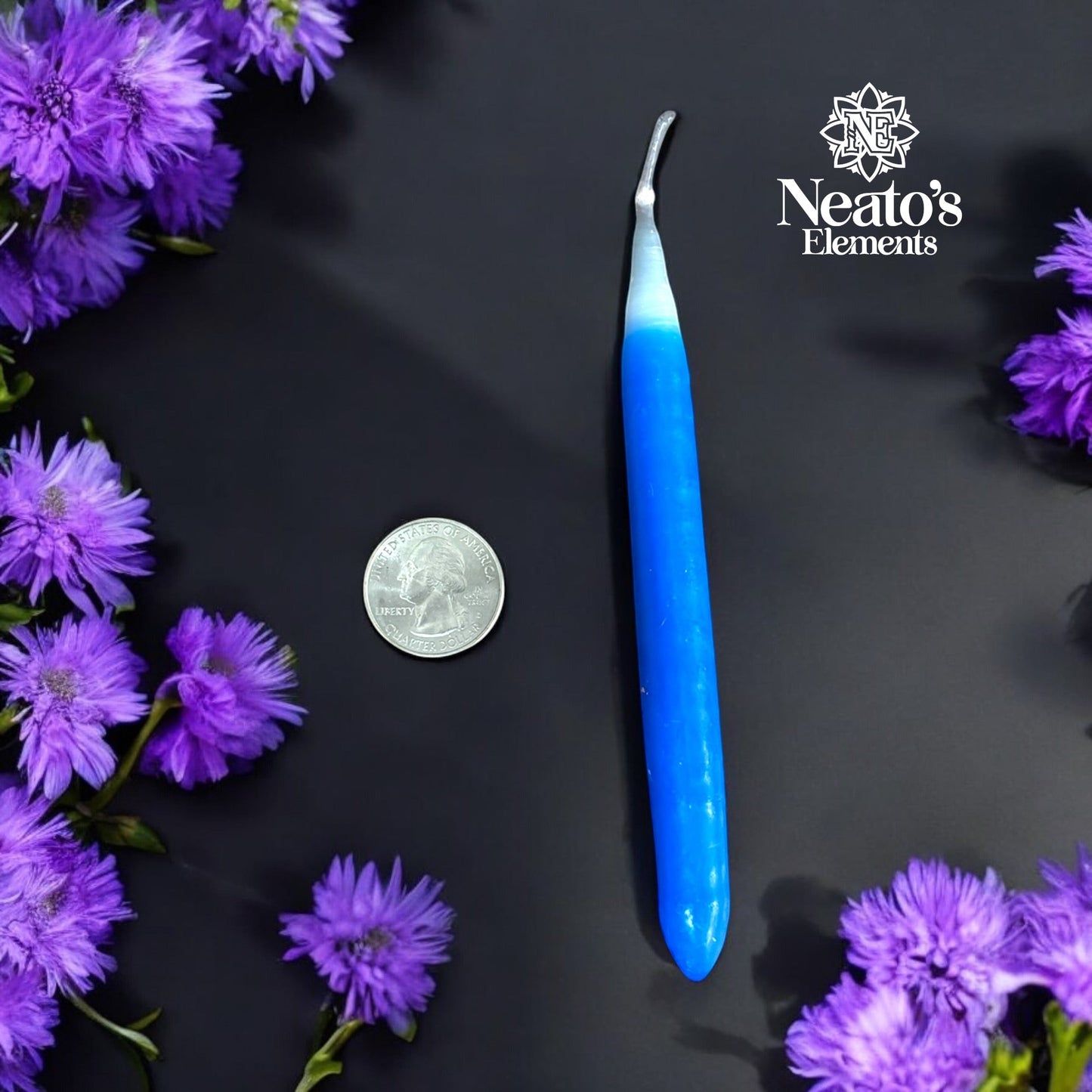 Neatos Elements blue hand-dipped taper candle with white tip, for protection and intention work.