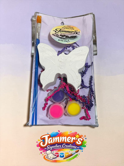 Neatos Elements Flutter & Buzz Crew Butterfly painting kit with white plaster butterfly, 3 paint pots, and 2 brushes.