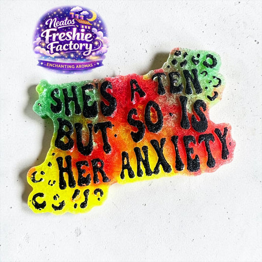 Neatos Elements Paradise Gone Wild car freshie with "She's a Ten But So Is Her Anxiety" text in black.
