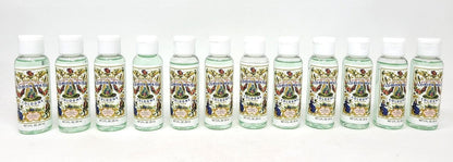 Neatos Elements Florida Water Cologne, 2 oz bottles with white caps. Features a clear liquid and ornate labels with floral and figural designs.