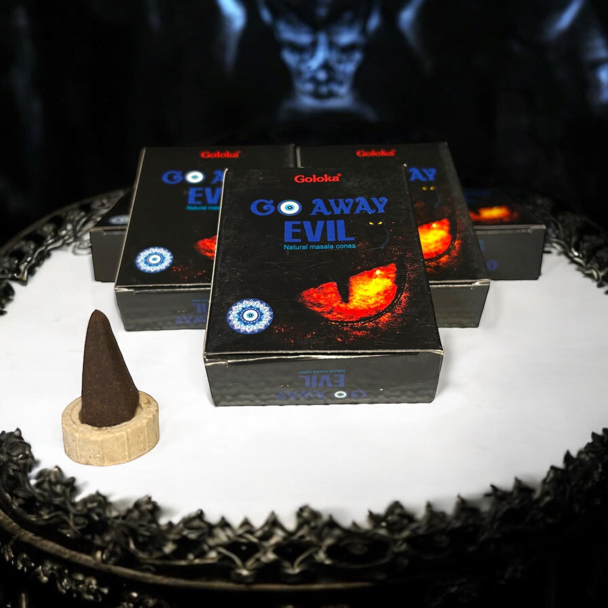 Neatos Elements Go Away Evil incense cones, natural masala, black box with fiery eye and blue evil eye symbol.
