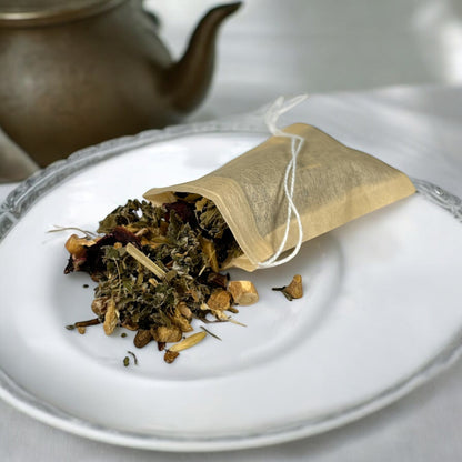 Neatos Elements Iron Root Tea Blend loose leaf herbal tea with nettle, dandelion root, ginger, and hibiscus.