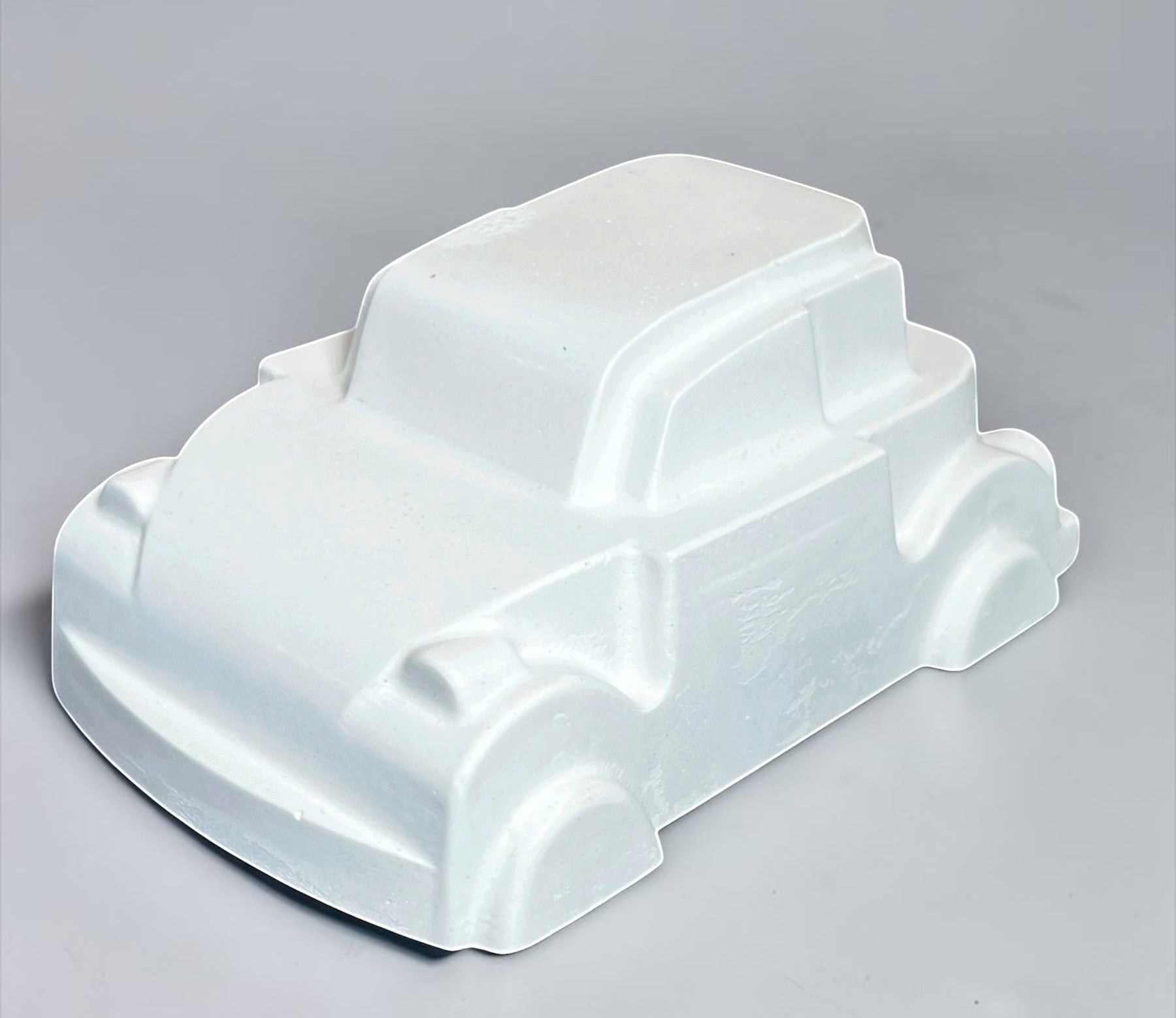 Neatos Elements white unpainted plaster mini motor figurine for crafting and painting.