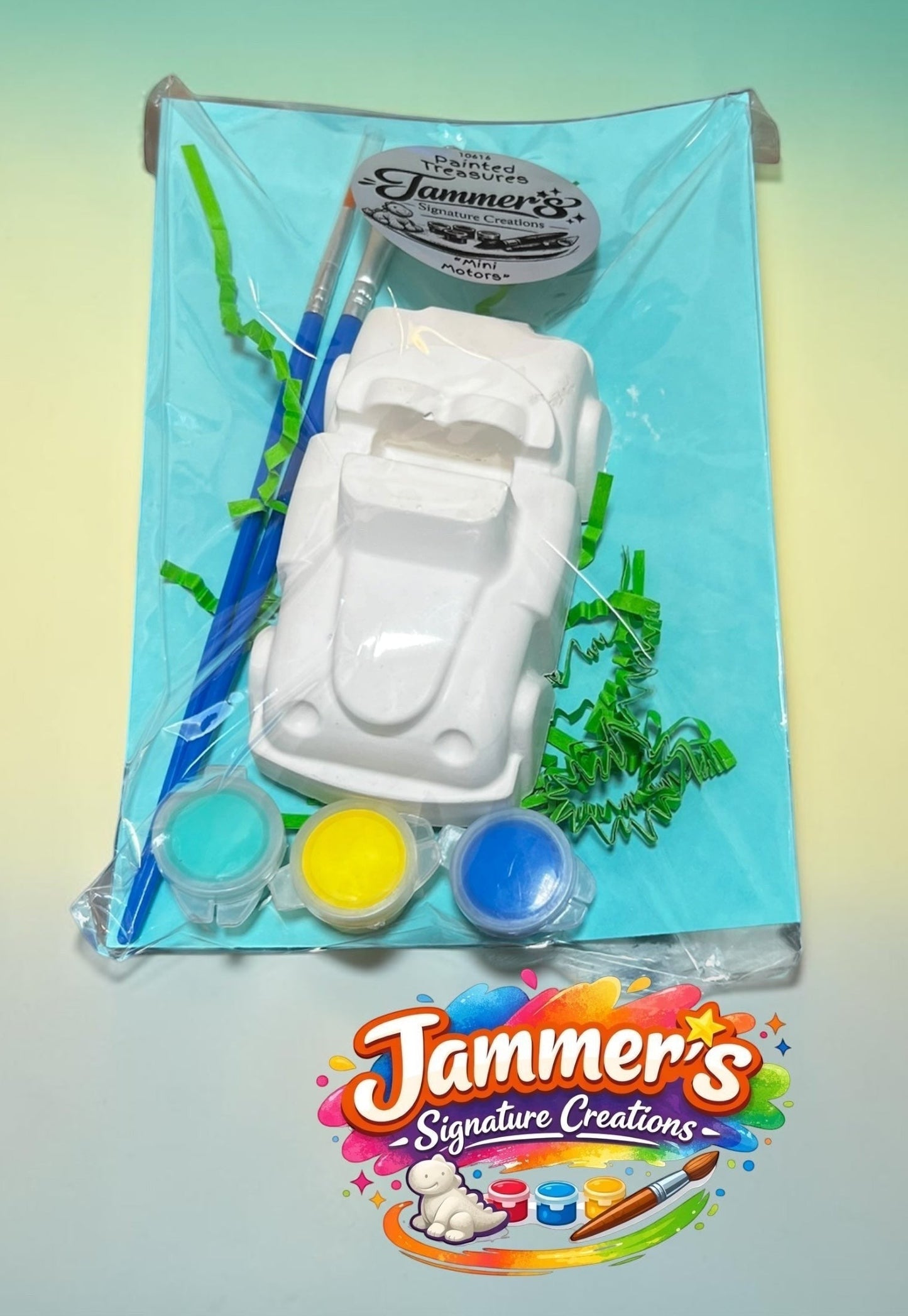 Neatos Elements Mini Motors paint kit with white plaster car, 3 paint pots, and 2 brushes.