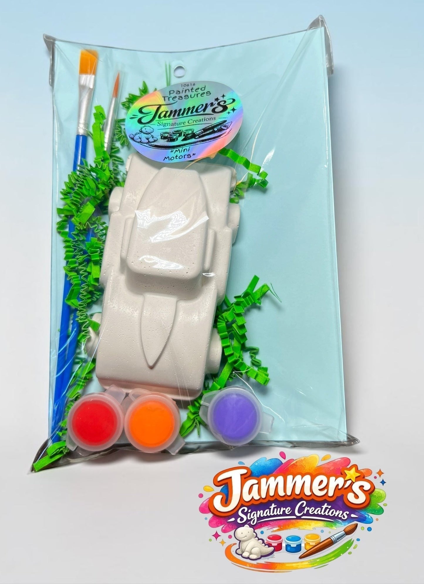 Neatos Elements Mini Motors paint kit with white plaster car, 3 paint pots (red, orange, purple), and 2 brushes.