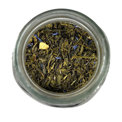Neatos Elements Paradise Green Tea Blend loose leaf tea with pineapple pieces and blue cornflower petals.