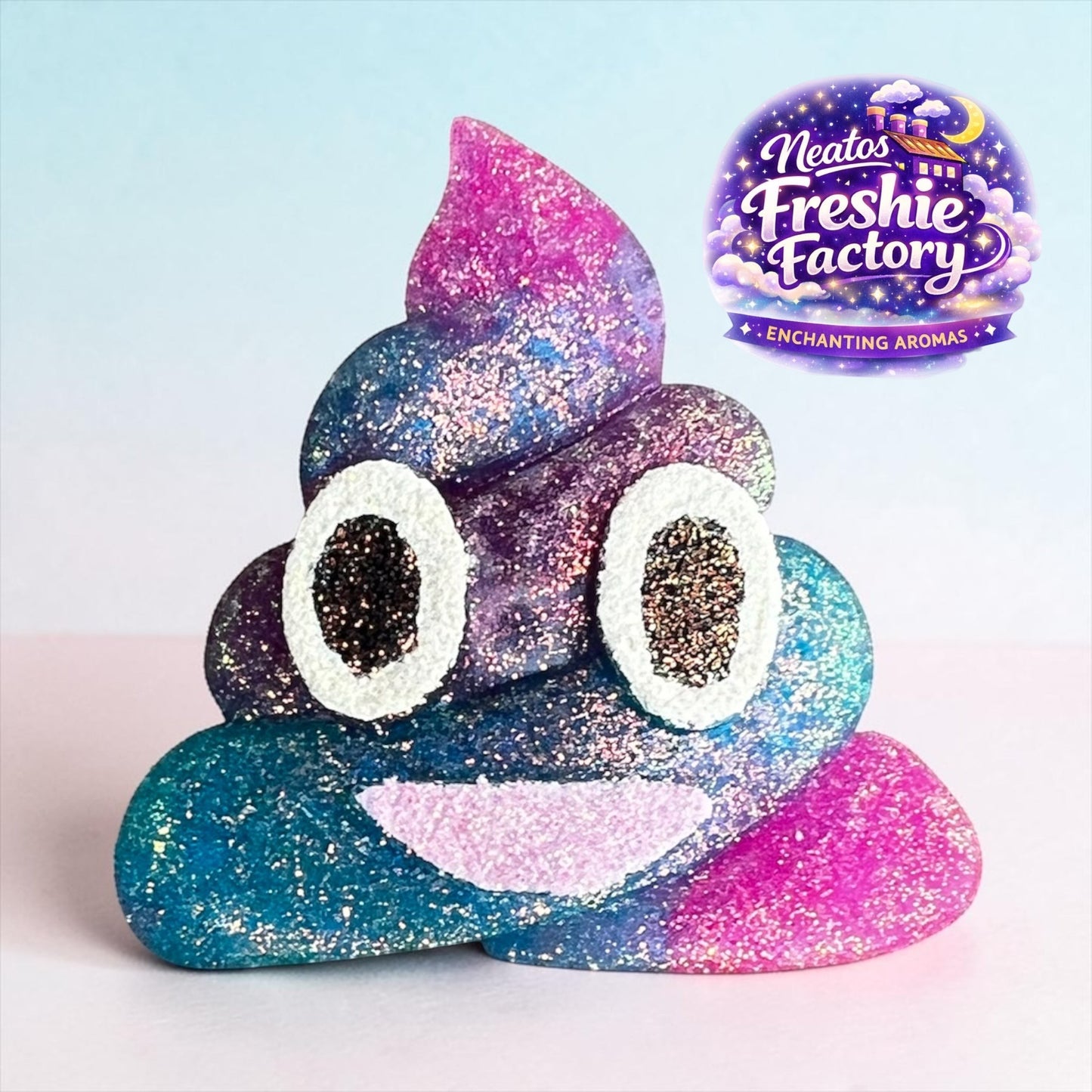 Neatos Elements handmade poop emoji car vent freshie with glittery blue, purple, and pink galaxy design and white eyes.