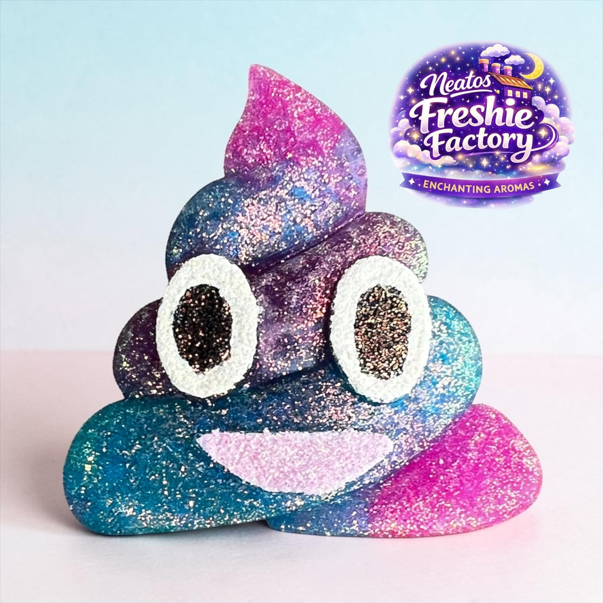 Neatos Elements handmade poop emoji car vent freshie with glittery blue, purple, and pink galaxy design and white eyes.
