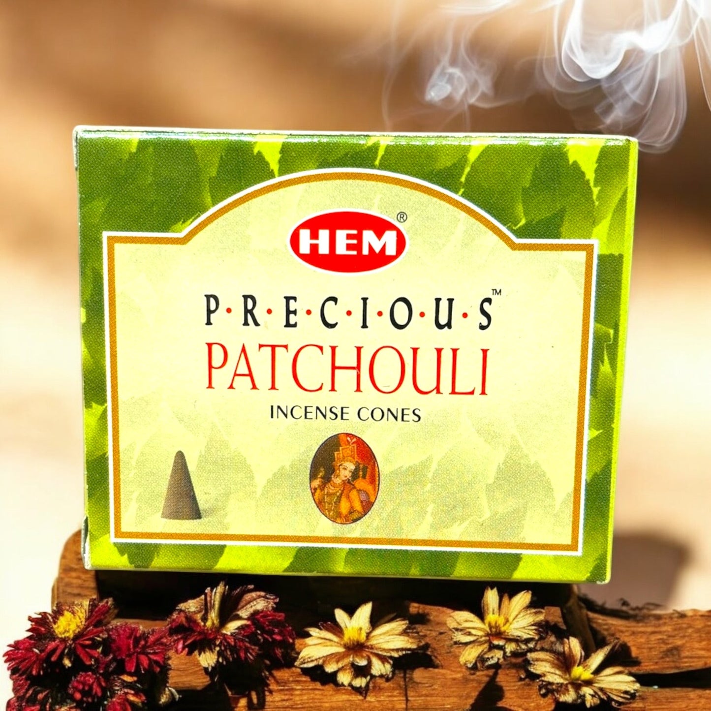 Neatos Elements Precious Patchouli Incense Cones box with smoke rising, featuring earthy scent for relaxation.