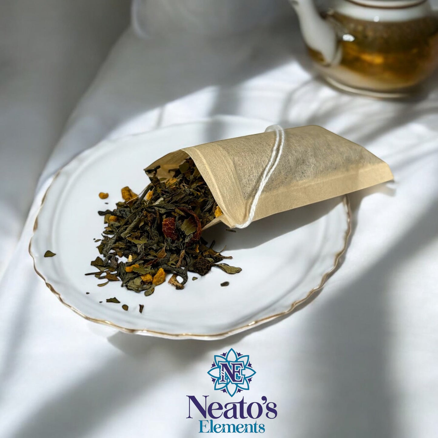 Neatos Elements Sterling's Tea Blend loose leaf tea with green tea, turmeric, ginger, rosehips, basil, and peppermint.