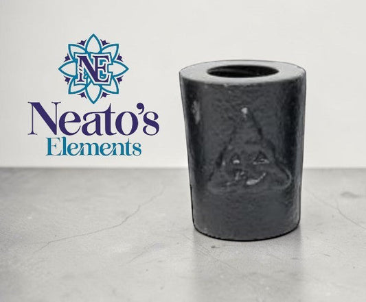 Neato's Elements black cast iron chime candle holder with embossed Triquetra symbol.