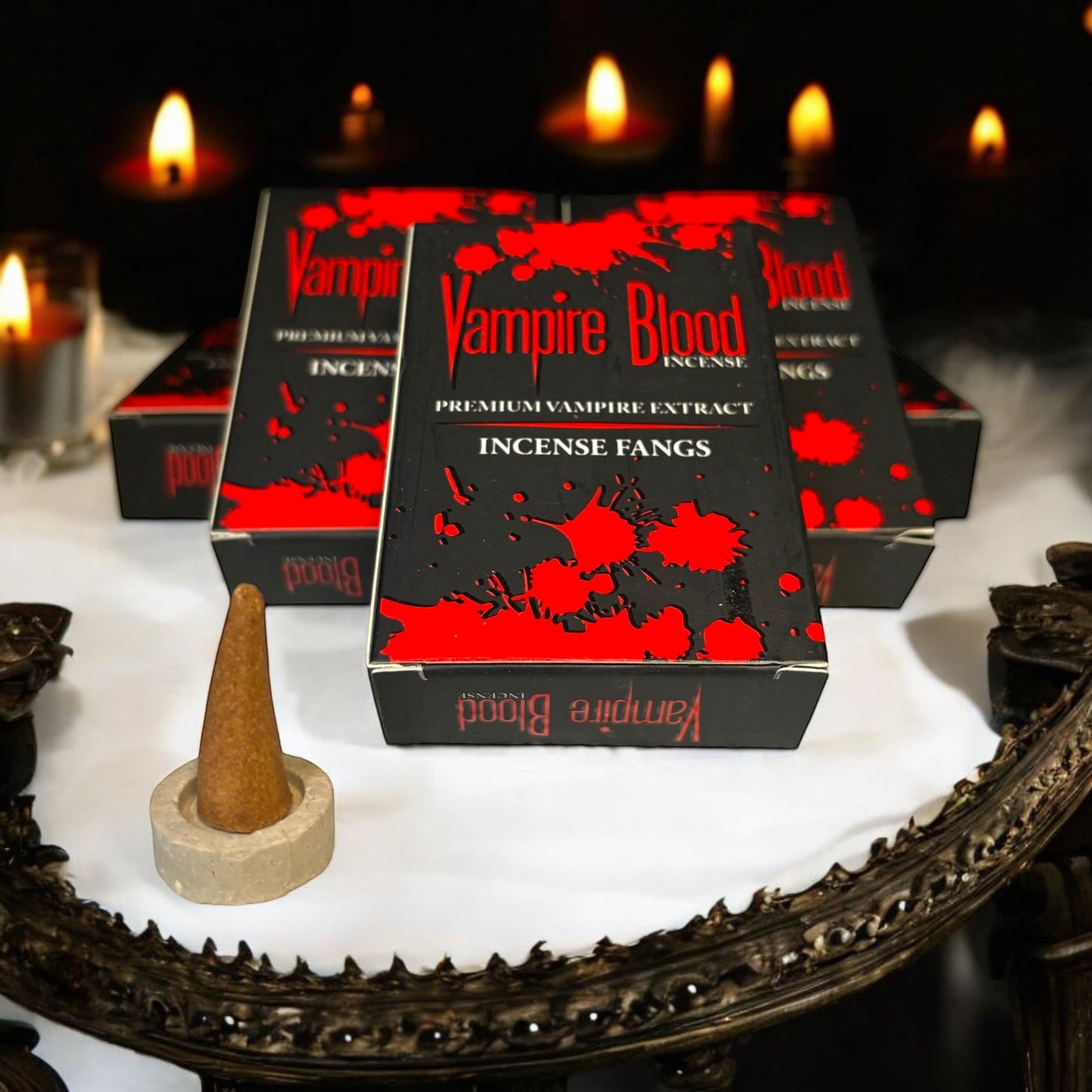 Neatos Elements Vampire Blood Incense Cones in black packaging with red blood splatters. A single cone sits in a holder.