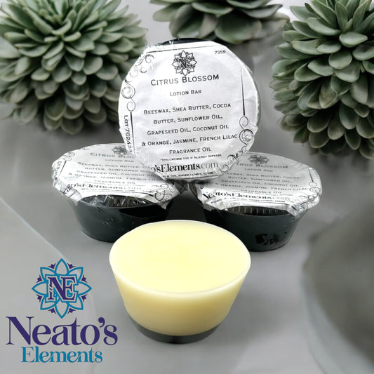 Neato's Elements Citrus Blossom Lotion Bar, solid, pale yellow, moisturizing, beeswax, shea butter, cocoa butter, sunflower oil, grapeseed oil, coconut oil.