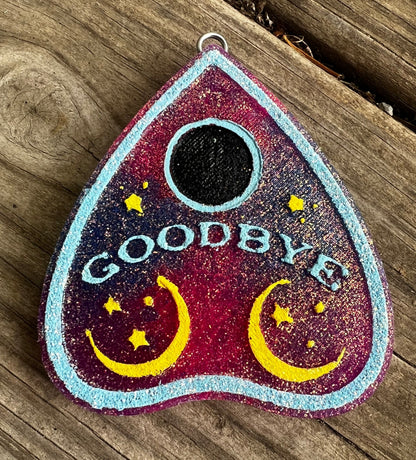Neatos Elements plum blossom planchette car hanging freshie with moons, stars, and "GOODBYE" text.