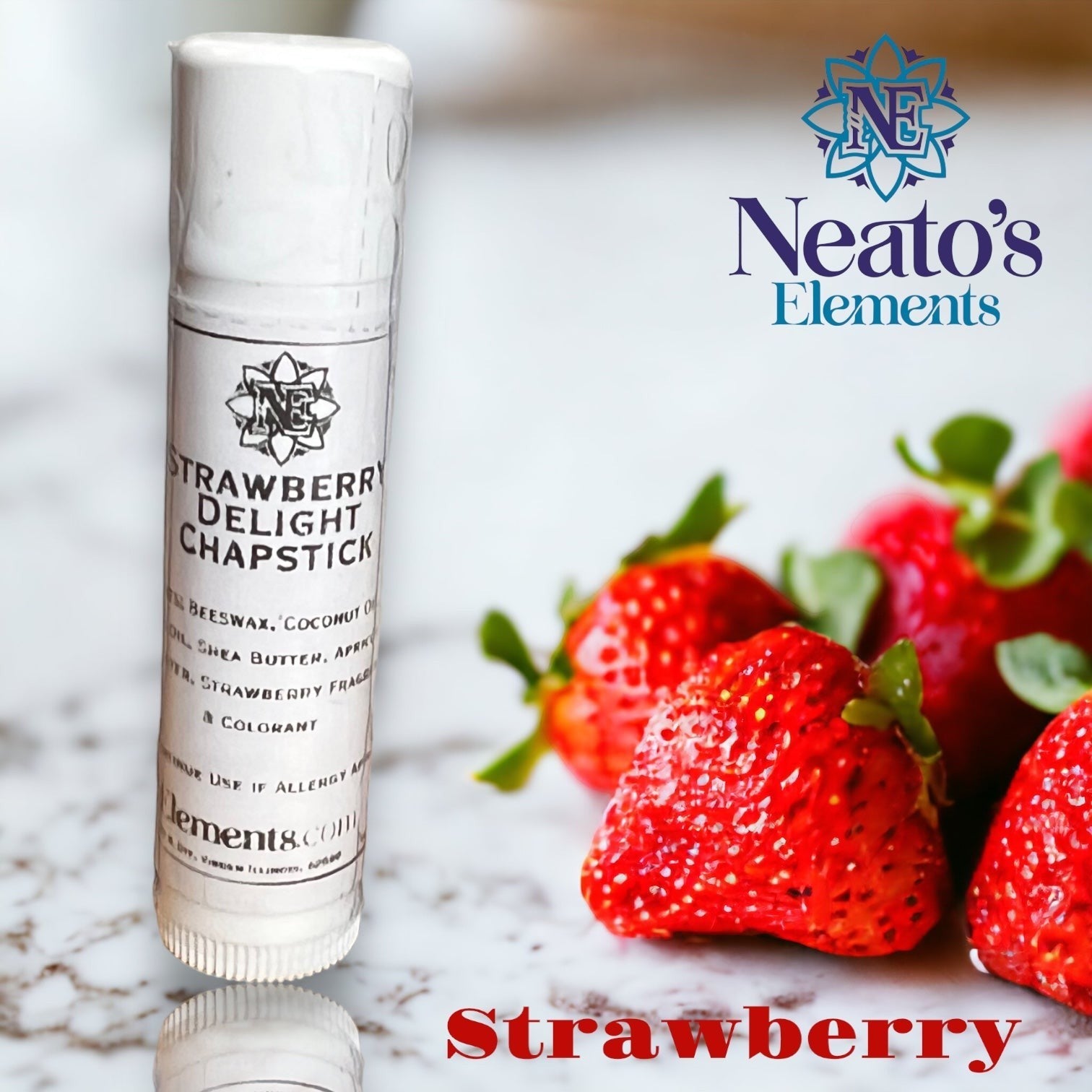 Neato's Elements Strawberry Delight Chapstick, a white tube with a black and white label, featuring juicy strawberries.
